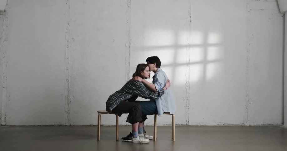 Two women hugging each other
