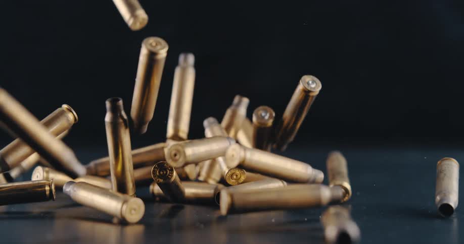 Bullets fall and bounce on the counter