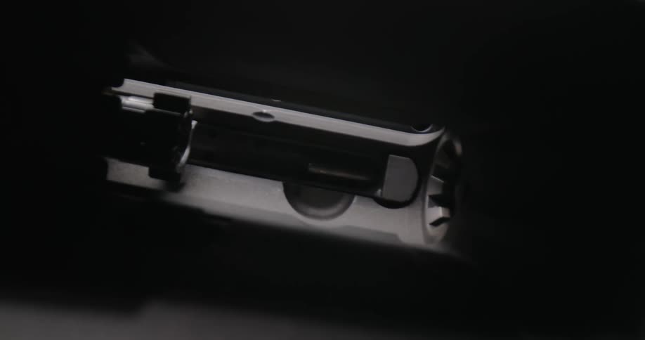 A view into a gun to the loading chamber