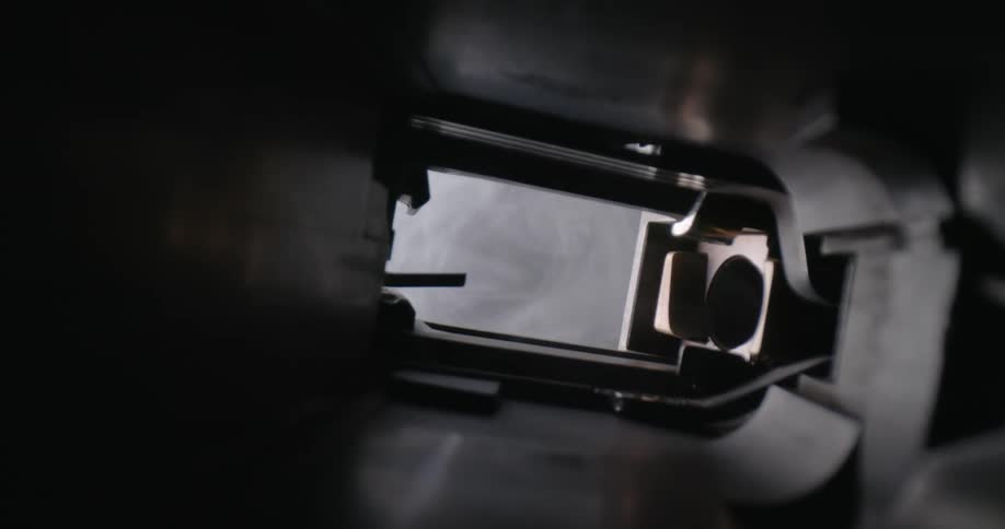 moving through the magazine well of a Glock Pistol