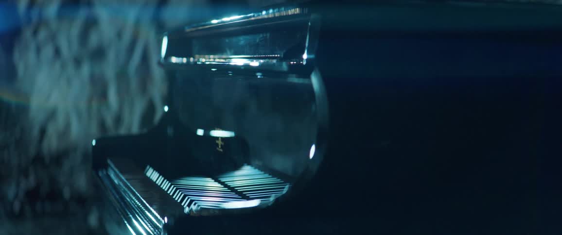 A shiny black piano