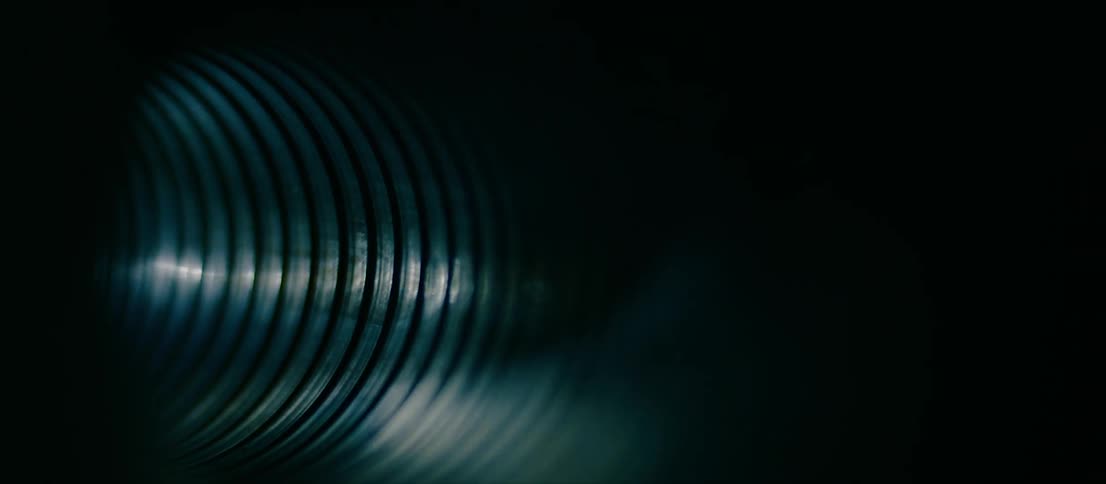 Black white and gray colors that look like a tube