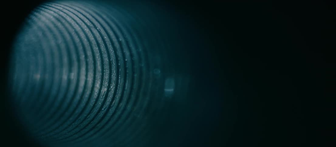 Black white and gray colors that look like mist of water in a tube