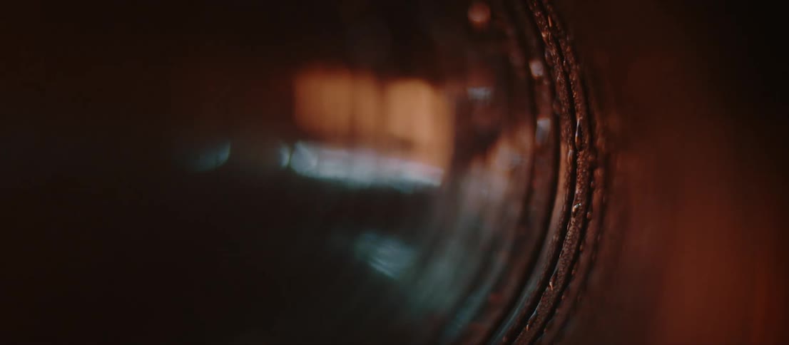 Abstract footage of light reflecting on metal