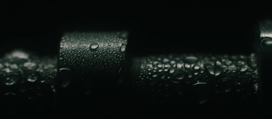 Metal with water droplets of condensation on it