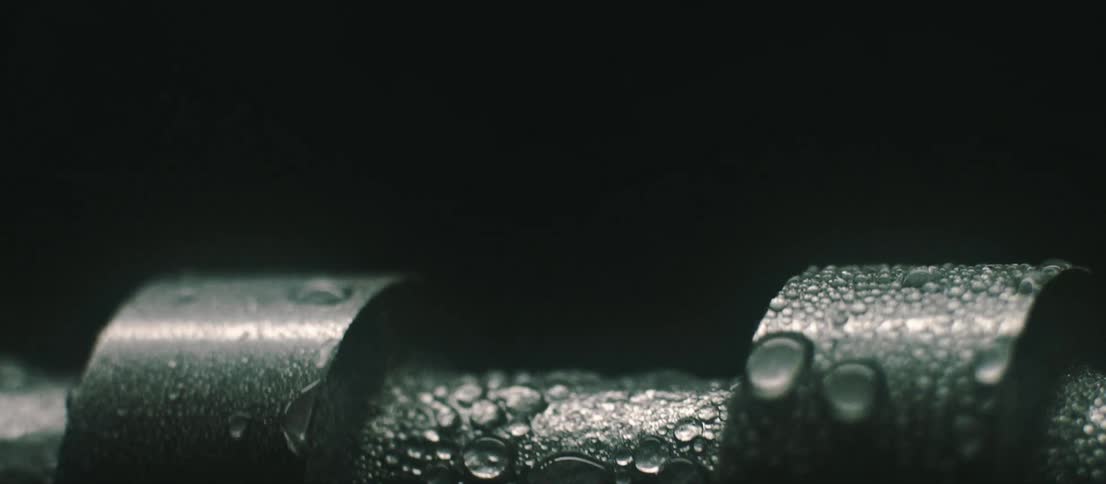 Metal with water droplets of condensation on it