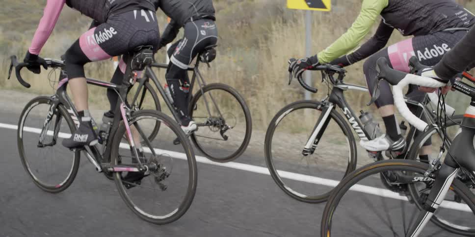 A group of cyclists on the street