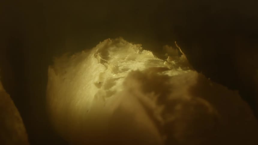 Crisp crust on bread cooking inside a hot oven at home