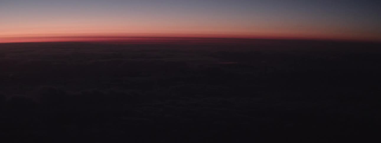 A view of a sunset on a horizon