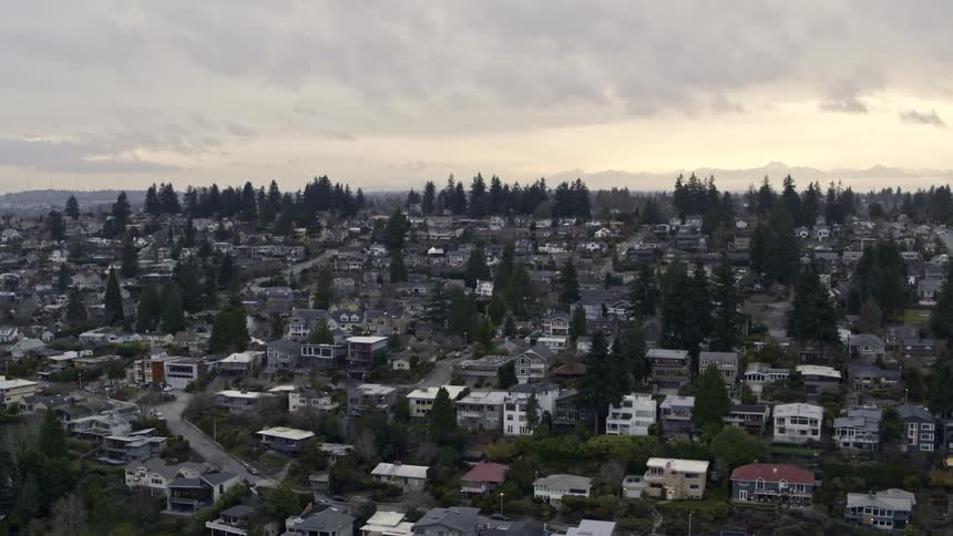 Subtle orbit around homes in the View Ridge neighborhood with the Olympic Mountains in the distance