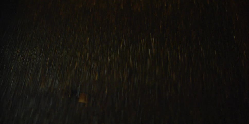 A wet road in the dark