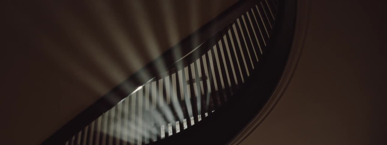 Sunlight beams shining on a staircase in a home