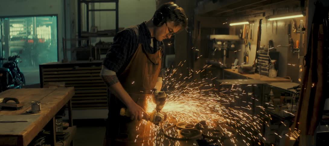 Man working on metal