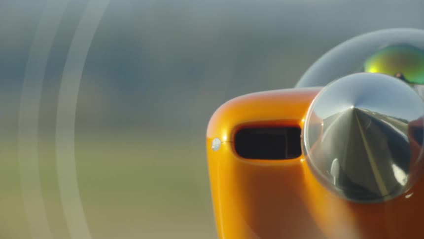The small single engine VFR airplane taxis on the runway getting ready for an evening of acrobatic flight