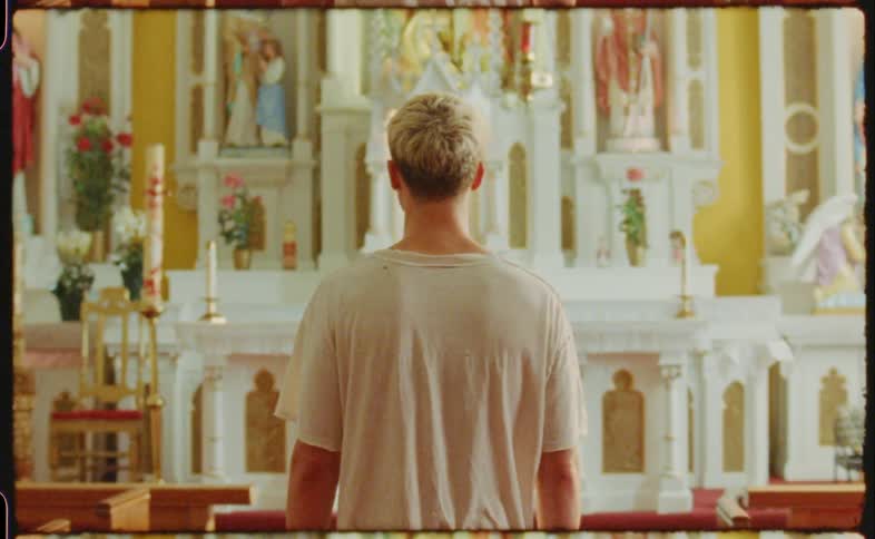 A man walking into a church