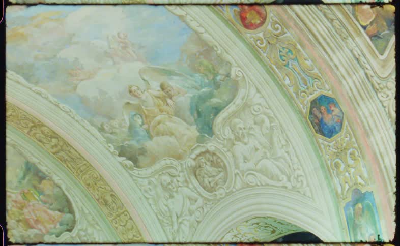 A building ceiling with art