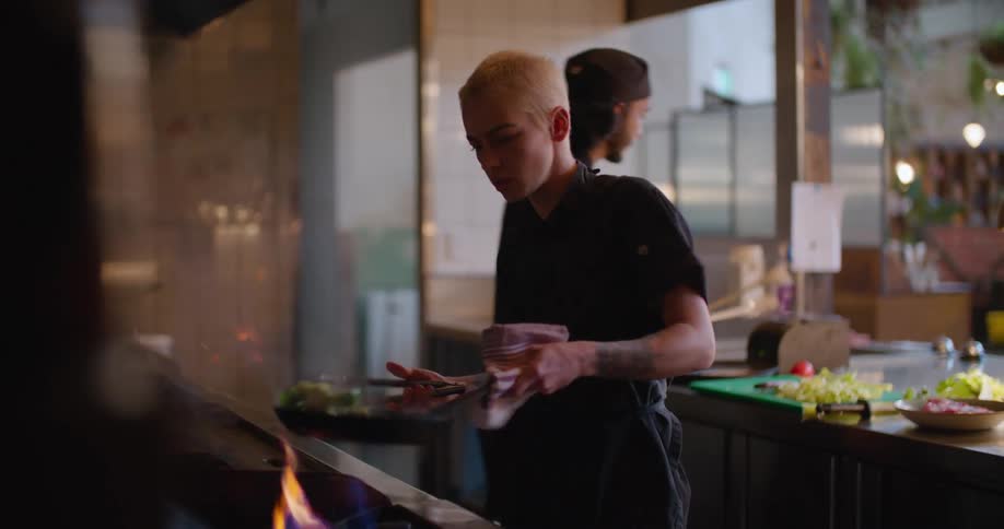 Male and female cooking