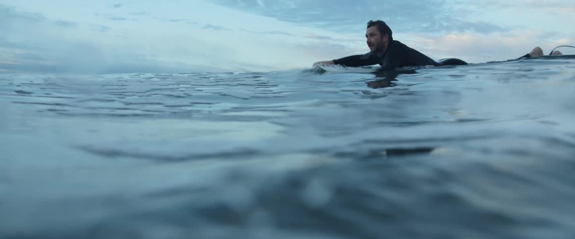 Man lying surfing
