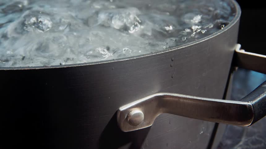 The pot is overboiling with water