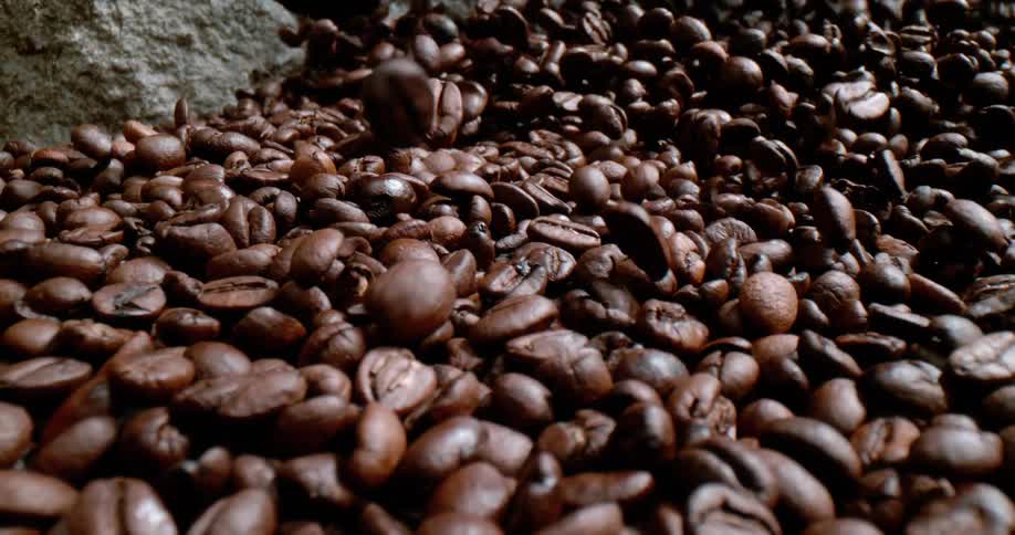 Coffee beans are falling ontop of each other