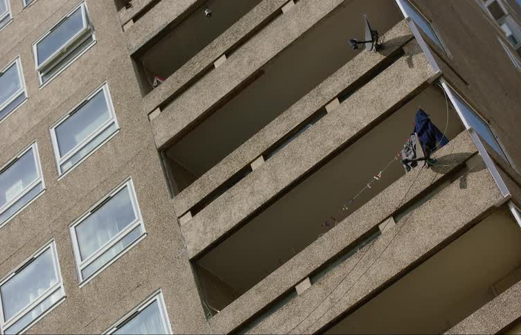Brown facade of an apartment building in the city