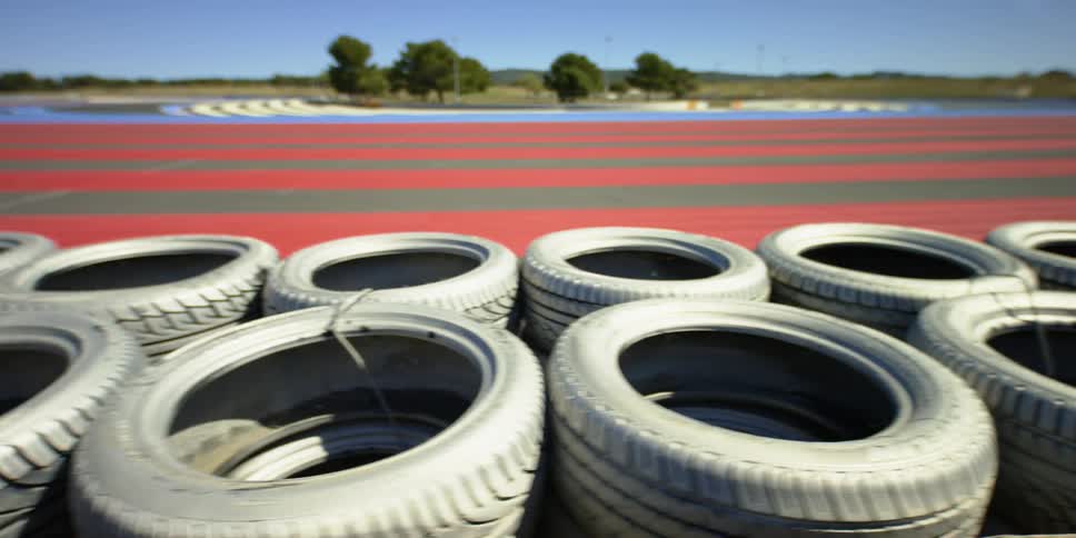 Tires lining a race track