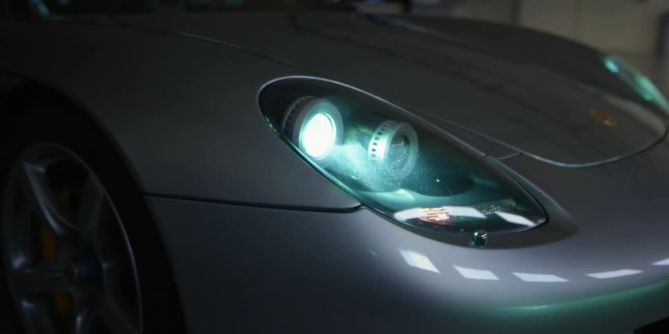 The headlights on the car turn on