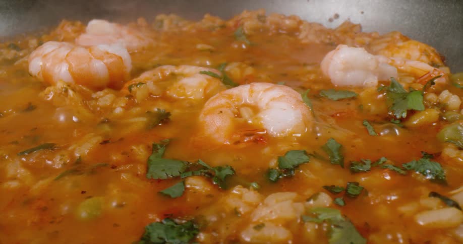 A view of shrimp in soup in a pot
