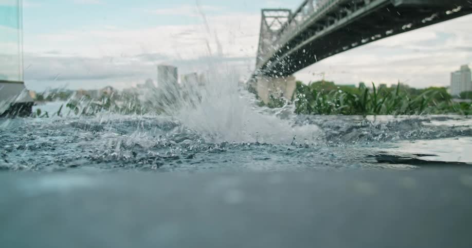 A man diving into a body of water