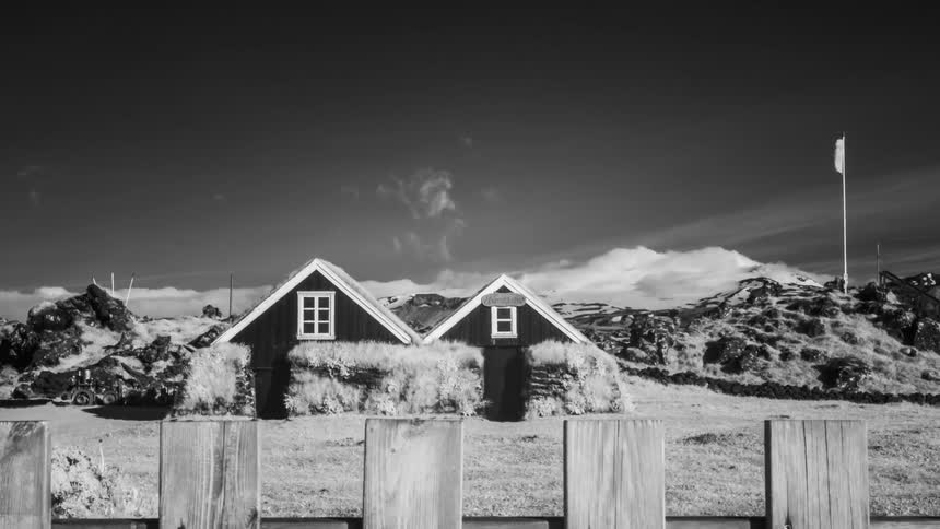 A time lapse of a house in a field