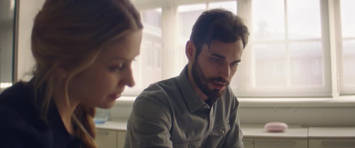 Coworkers working together in the office meeting room talking to each other