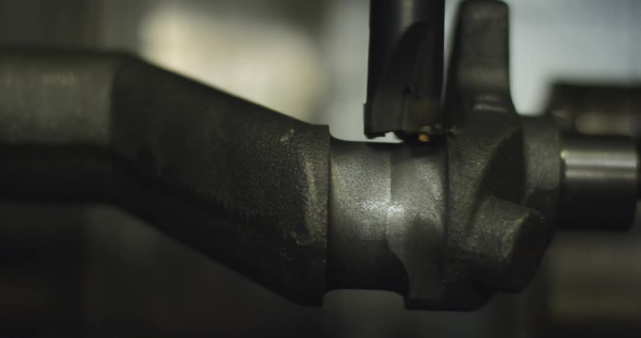 A mill working on a piece of metal