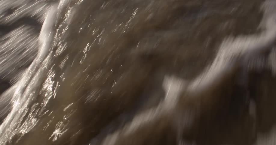 Close up view of foamy rushing water