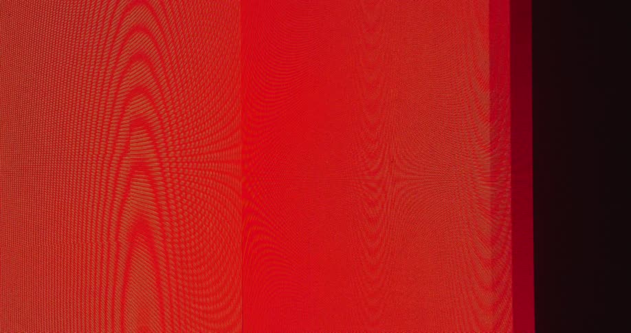 A screen turning on and bright red