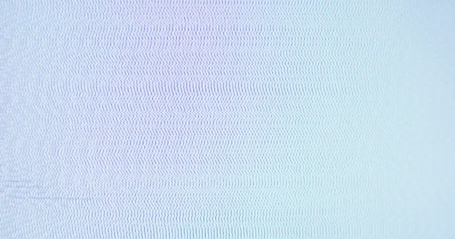 A black screen turns to static and vibrating lines of blue and white