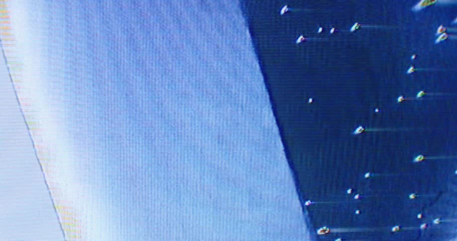 Abstract shapes spinning and moving on a screen