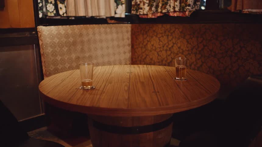 A view of a table in a restaurant at night