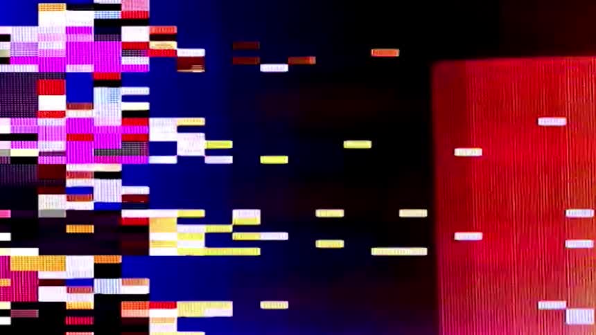The television is flickering on the distorted footage