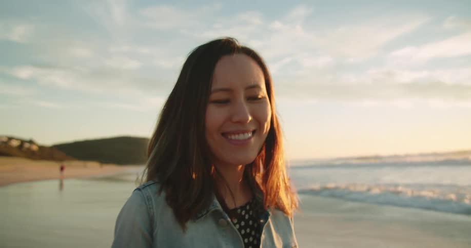 A portrait of a woman at the beach