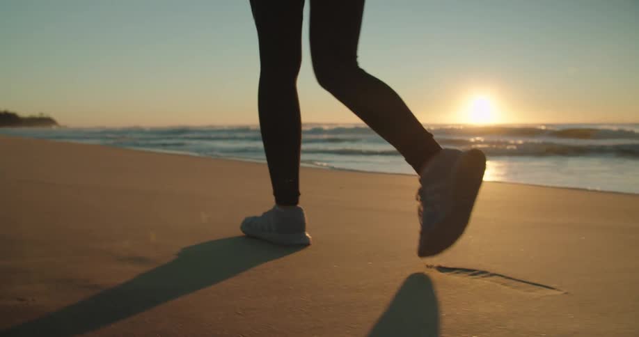 A woman walking on the beach
