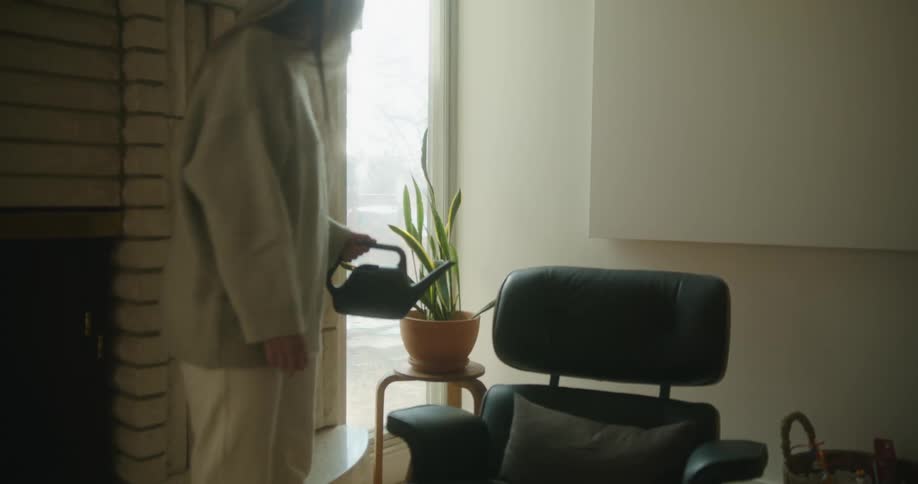 A woman watering her plants