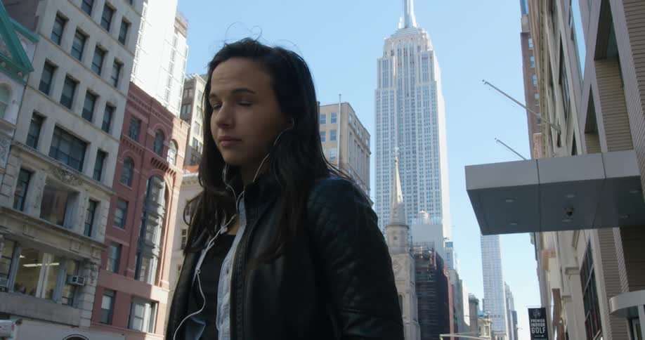 A woman is walking in the city