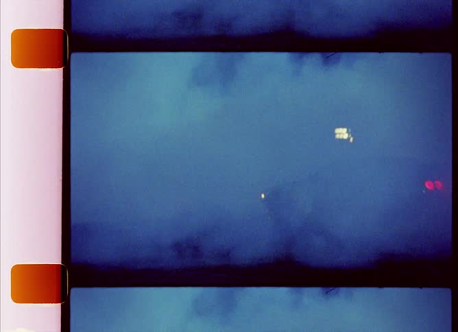 A view of a car drifting at night