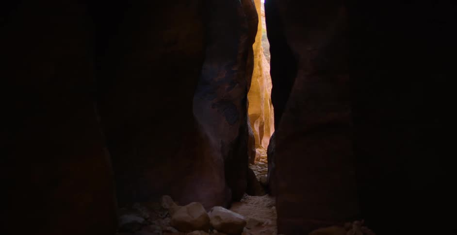 A tunnel with dirt and rocks