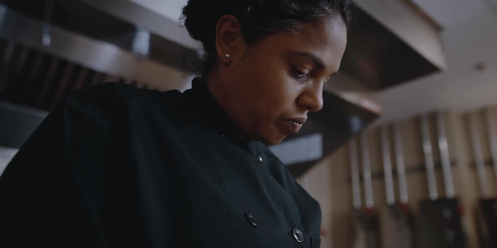 A woman preparing vegetables
