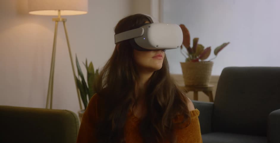 A woman wearing a vr headset