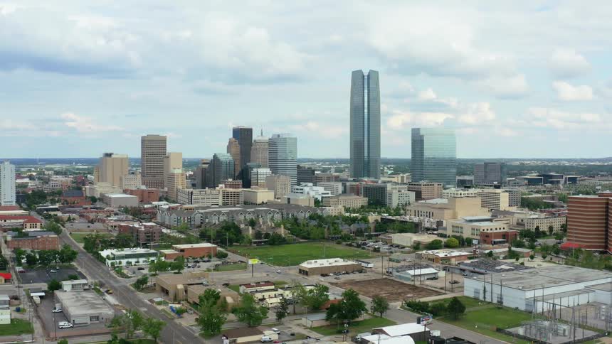 Aerial view of city skyline with neighborhoods