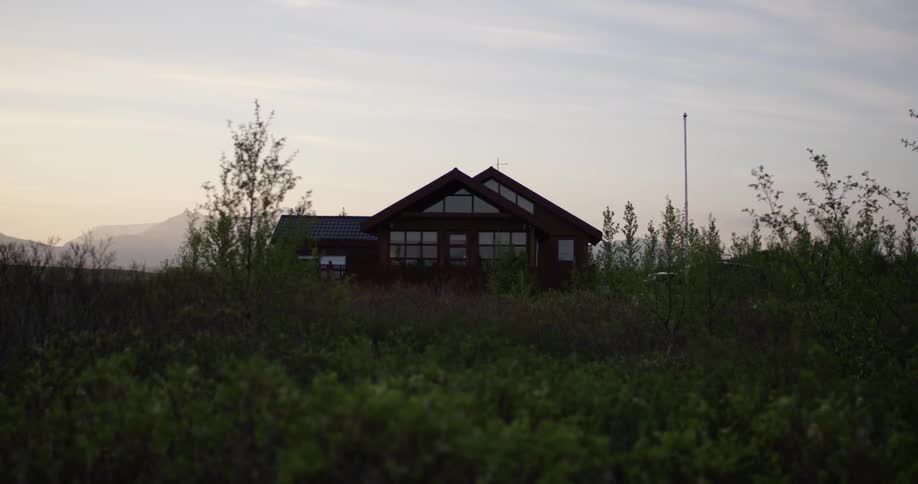 A house sitting alone on the countryside