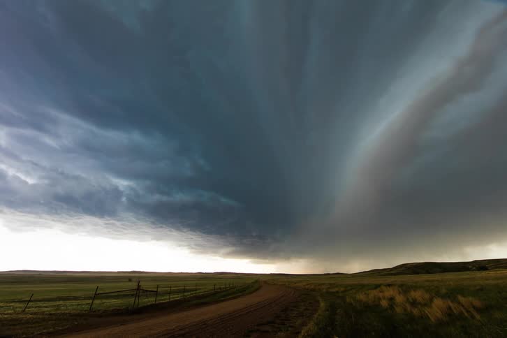 The rain storm is moving in the distance