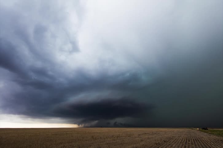 Tornado clouds in rotation as tornado moves on the ground